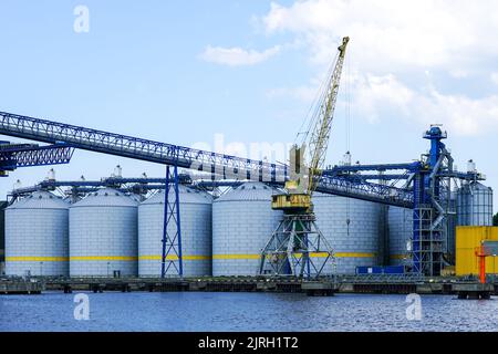 Versatile grain terminal in Ventspils port for transfer large range and amount of agricultural products Stock Photo