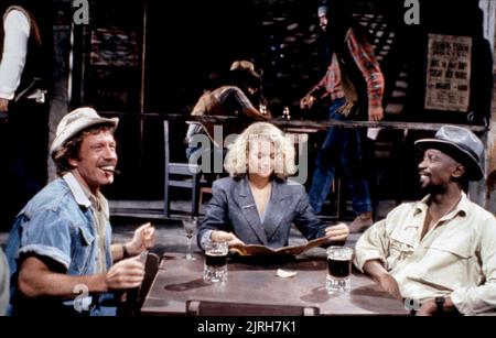 CHUCK NORRIS, MELODY ANDERSON, LOUIS GOSSETT JR., FIREWALKER, 1986 Stock Photo