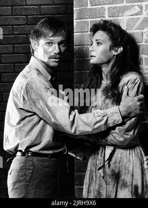 RICHARD THOMAS, MARY CROSBY, FINAL JEOPARDY, 1985 Stock Photo