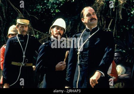 GRAHAM CHAPMAN, MICHAEL PALIN, JOHN CLEESE, MONTY PYTHON'S THE MEANING OF LIFE, 1983 Stock Photo