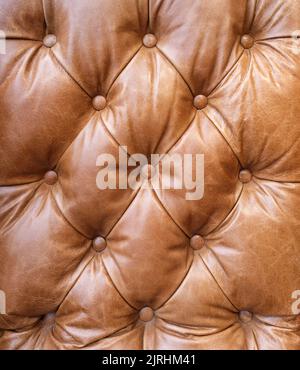 Abstract Background Texture Of Luxury Tan Leather Upholstery On A Retro Armchair Stock Photo