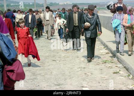 May 6, 1990, Botosani County, Romania. The Bridge of Flowers (Podul de Flori) event along the Prut River, that separated Romania and the Moldavian Socialist Republic. People were allowed for the first time since WWII to cross the border to their 'brothers' without a passport or visa. Stock Photo