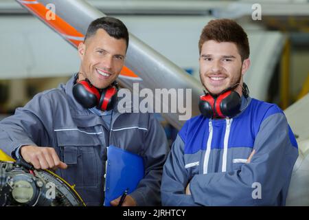 portrait of two flight mechanics Stock Photo
