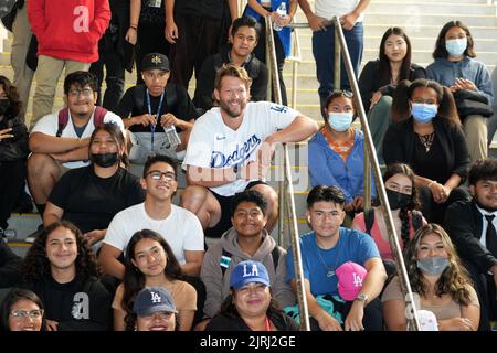 Los Angeles Dodgers pitcher Clayton Kershaw (22) poses with Miguel Contreras Learning Complex high school students during the Dodgers Love LA Community Tour, Wednesday, Aug. 24, 2022, in Los Angeles. Stock Photo