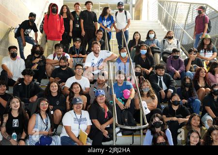 Los Angeles Dodgers pitcher Clayton Kershaw (22) poses with Miguel Contreras Learning Complex high school students during the Dodgers Love LA Community Tour, Wednesday, Aug. 24, 2022, in Los Angeles. Stock Photo