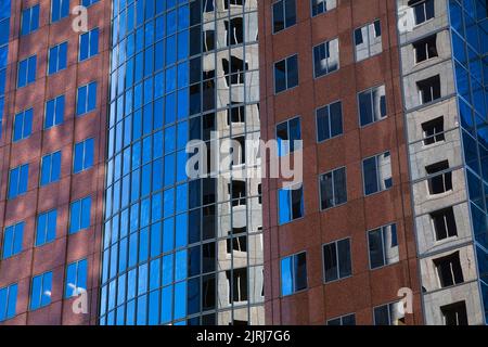 Reflections in a modern glass and steel architectural style office building. Stock Photo