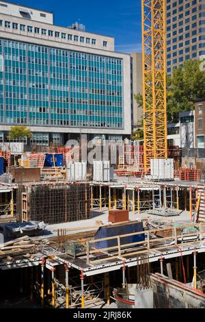 New commercial construction site on Rene-Levesque boulevard, Montreal, Quebec, Canada. Stock Photo