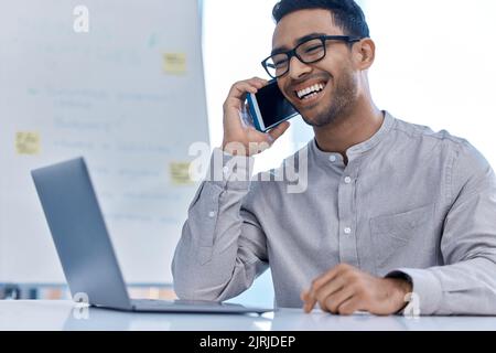 Comic businessman communication, talking and mobile call on a phone at a office computer. Phone call of laughing, happy and funny working corporate Stock Photo