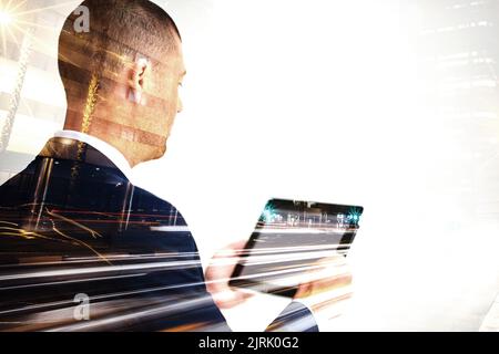 Keeping up with the fast-paced business world. Multiple exposure shot of a mature businessman using a digital tablet superimposed over a cityscape. Stock Photo