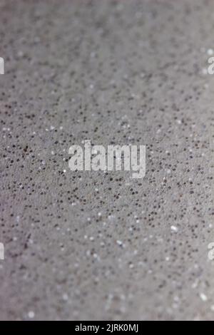Full frame abstract texture of shimmering silver glitter background with selective focus Stock Photo