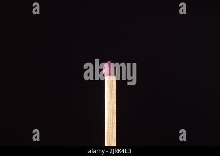 The match is ready to use in purple. Horizontal photo. Stock Photo