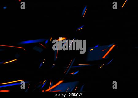 Multicolored neon lights on a dark background, motion effect. High quality photo Stock Photo