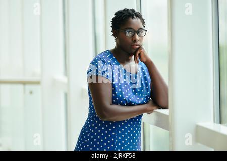 Portrait of beautiful Black woman in glasses Stock Photo