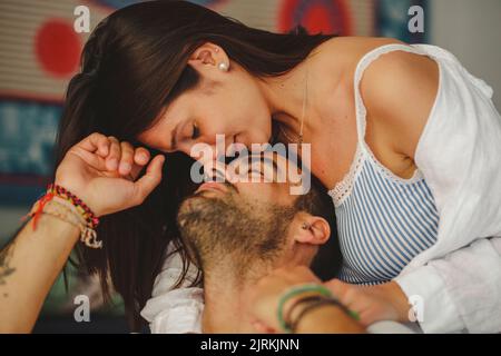 Young beautiful couple having good time at home Stock Photo