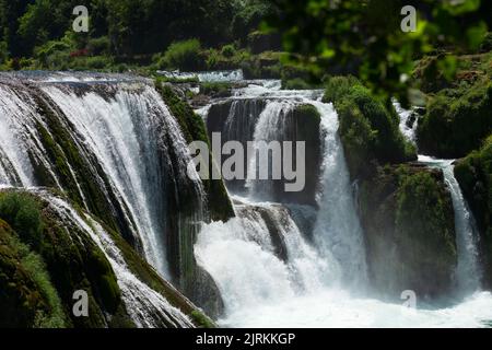 a magnificent waterfall called strbacki buk on the beautifully clean and drinking Una river in Bosnia and Herzegovina in the middle of a forest. Stock Photo