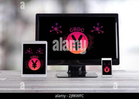 Cbdc concept shown on different information technology devices Stock Photo