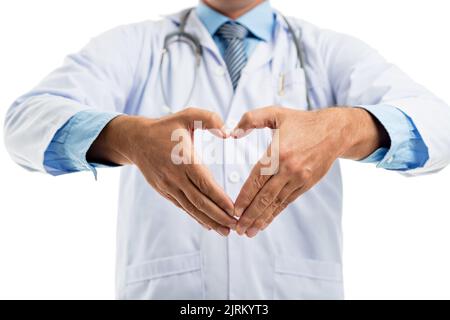 Cropped image of general practitioner making heart shape with her hands Stock Photo