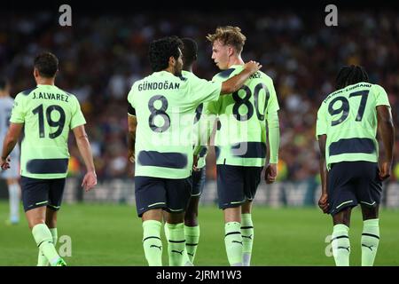 Cole Palmer of Manchester City celebrate a goal with Ilkay Gundogan of Manchester City during the benefic friendly match to raise funds for ELA between FC Barcelona and Manchester City at Spotify Camp Nou in Barcelona, Spain. Stock Photo