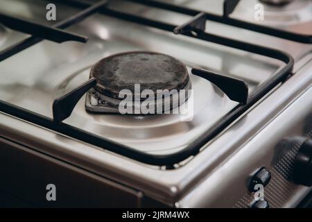 The gas burner is turned off in the kitchen in the apartment. Stock Photo