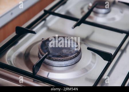 The gas burner is turned off in the kitchen in the apartment. Stock Photo