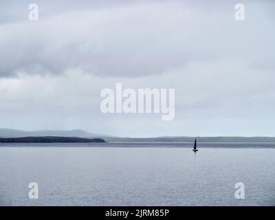 Yacht off Mull Head, Orkney, Scotland Stock Photo