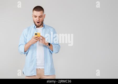 handsome man with mobile cell phone surfing internet Stock Photo