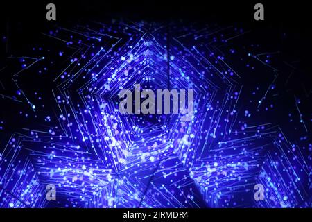 Blue kaleidoscope ornament. Carousel kaleidoscope. Horizontal blurry picture Stock Photo