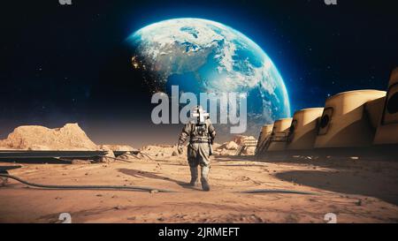 The Brave Astronaut in Space Suit Confidently Walking on Mars towards Earth.Space Station and Mars Rove
