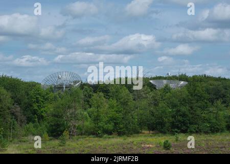 Westerbork, The Netherlands-July 2021; Close up of the dish of Westerbork Synthesis Radio Telescope (WSRT) deployed in linear array built on the site Stock Photo