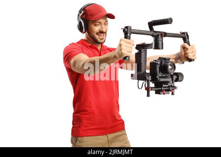 Camera operator recording with a camera gimbal stabilizer isolated on white background Stock Photo