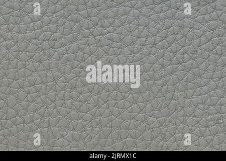 Natural, artificial gray leather texture background. Material for sport items, clothes, furnitre and interior design. ecological friendly leatherette. Stock Photo