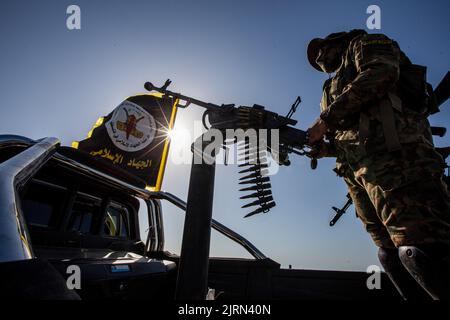 Gaza, Palestine. 24th Aug, 2022. Armed fighters of Al-Quds Brigades, the military wing of Islamic Jihad, participate in an anti-Israel military parade in Rafah, southern Gaza Strip. An Egyptian-brokered ceasefire between Israel and Islamic Jihad began late Sunday evening, August 7, 2022, and three days of violence ended. (Photo by Yousef Masoud/SOPA Images/Sipa USA) Credit: Sipa USA/Alamy Live News Stock Photo