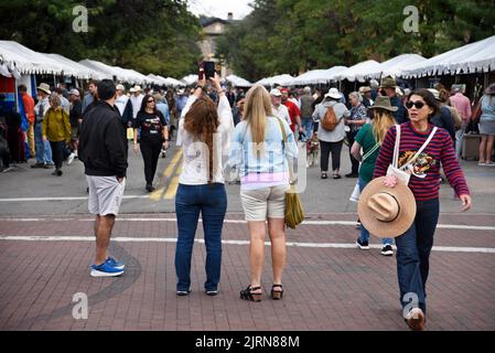 Visitors enjoy the annual Santa Fe Indian Market in Santa Fe, New Mexico. Stock Photo