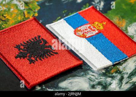 Flags of Albania and Serbia, Concept, Difficult relations between the two countries, Conflict over the Serb minority in Kosovo Stock Photo