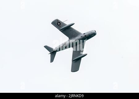 Eastbourne, East Sussex, UK.. 20th Aug, 2022. Featuring an vintage Russian MIG-15 at the annual Eastbourne Airshow viewed from the beach at Eastbourne. 21st August 2022. Credit David Smith/Alamy Live News Credit: David Smith/Alamy Live News Stock Photo