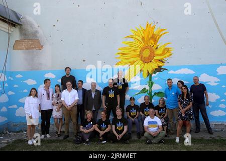 KYIV REGION, UKRAINE - AUGUST 24, 2022 - Delegation of the United for Ukraine association of parliamentarians of the EU member states (U4U-United for Ukraine) visit the Central Palace of Culture of Irpin damaged during shelling by the russian troops, Irpin, Kyiv Region, north-central Ukraine. Stock Photo