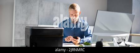 Wireless Print On Printer Using Mobile Phone Stock Photo