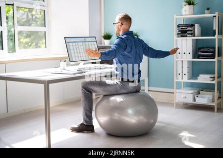 Stretching Office Workout. Desk Stretch Exercise At Workplace Stock Photo