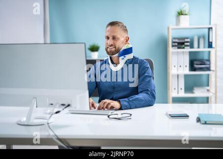 Disability Accident In Office. Broken Neck Brace Stock Photo