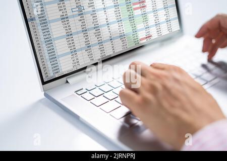 Medical Spreadsheet Coding On Laptop. Finance Job Stock Photo