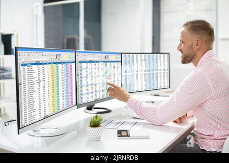 Medical Spreadsheet Coding On Laptop. Finance Job Stock Photo
