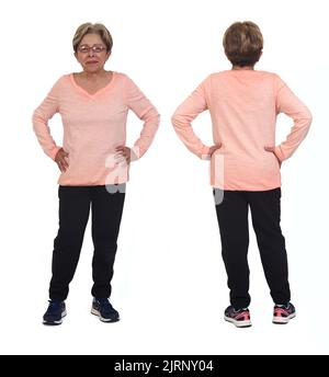 front and back view of same senior woman with sportswear on white background Stock Photo