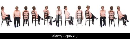 same senior women sitting on chair on white background Stock Photo