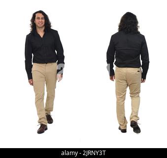 back and front of a man smiling and walking with shirt pants and shoes on white background Stock Photo
