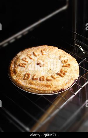 Homemade blackberry and apple pie. Made with homegrown apples and wild blackberries from England. Stock Photo