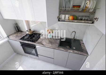 High angle view to white modern domestic kitchen furniture and interior Stock Photo