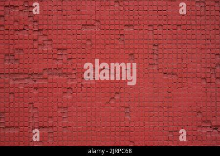 Red checkered pattern texture with missing blocks. Stock Photo