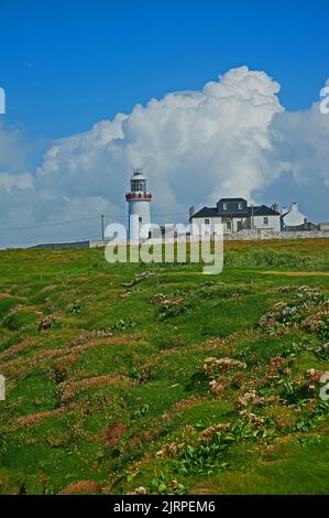 Loop Head Lighthouse on the Loop Head peninsula, County Clare, Ireland forms part of the Wild Atlantic Way Stock Photo