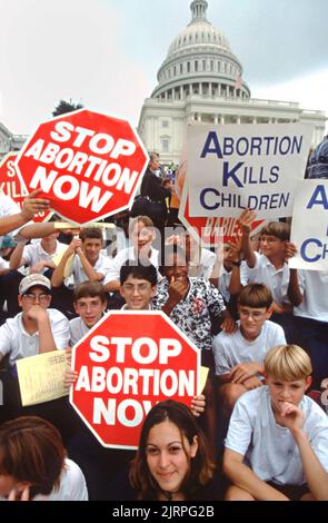 Catholic school children pose with anti-abortion signs in front of the U.S. Capitol building during a protest against abortion rights during a  September 12, 1996 in Washington, DC. Stock Photo