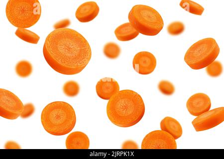 Falling Carrot slice isolated on white background, selective focus Stock Photo